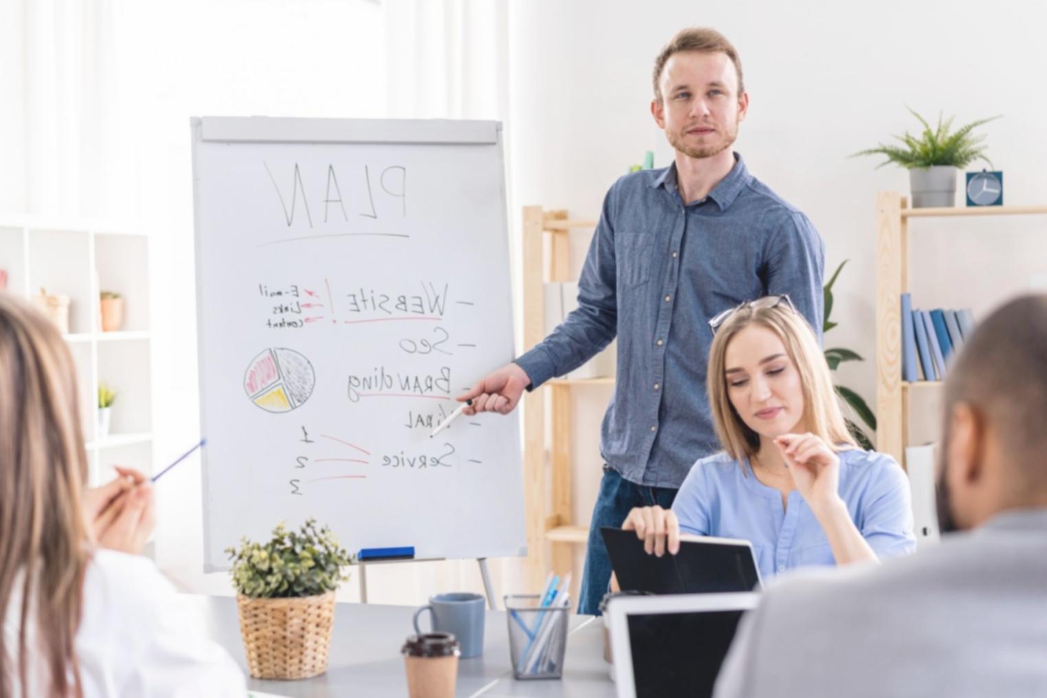 Professional team analyzing financial data on multiple computer screens